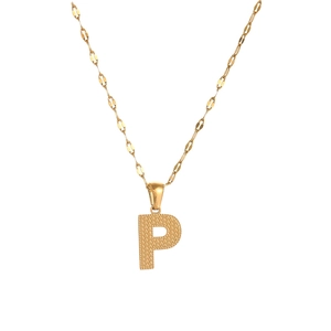 Detail shot of golden letter P pendant with unique honeycomb texture on fine chain
