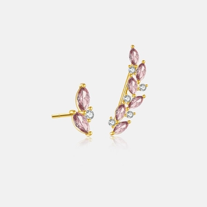 Detailed close-up of asymmetric 925 silver earrings with pink marquise zircon stones