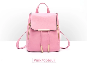 Detailed view of pink PU leather backpack featuring metal trim and dual side zippers