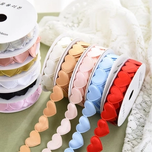 Colorful heart shaped satin ribbons for Valentine's floral gift wrapping and DIY crafts