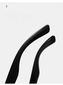 Detail view of glossy black curved temples for comfortable fit on polarized sunglasses