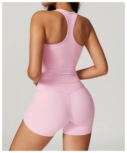 Rear view of pink racerback tank top and high waist compression shorts yoga set