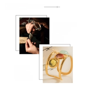 Close-up of gold-plated stainless steel ring featuring three colorful oval gemstones