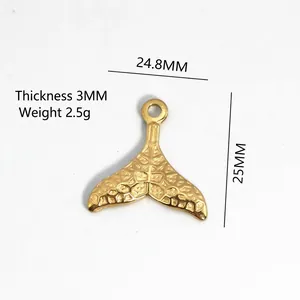 Golden stainless steel fishtail pendant with textured scale details and dimensions