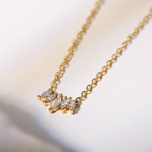 Vintage 18k gold plated titanium necklace with five marquise-cut sparkling zircons