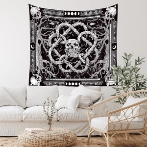 Detailed view of gothic skull tapestry with mystical moon phase and thorny patterns