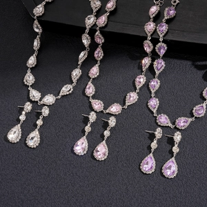 Luxury two-piece rhinestone water drop jewelry sets in white pink and purple colors