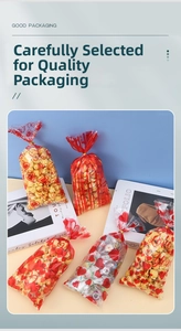 Detail of red heart and love pattern cellophane bags filled with popcorn and candy