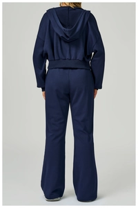 Back view of high-waisted navy blue fleece sweatpants and matching cropped hoodie set