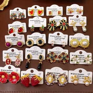 Set of 20 pairs vintage style earrings featuring 925 silver needles and various designs