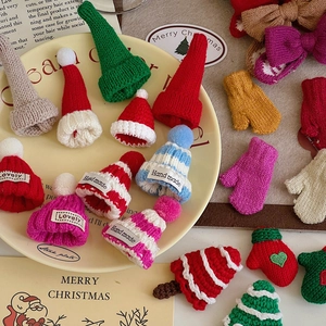 Miniature knitted Christmas hats and gloves for DIY crafts and gift box decorations