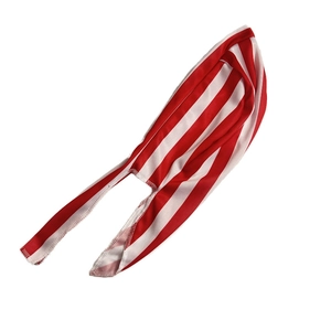 Detail of red and white striped breathable durag with long straps and fine stitching