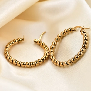 Chic 14K gold plated stainless steel C-shaped beaded hoop earrings on satin