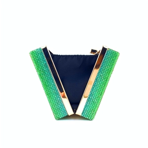 Detail of open rainbow evening clutch bag with green gradient rhinestones and gold frame