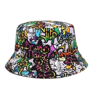 Close-up of hip-hop graffiti print and high-quality cotton fabric on a bucket hat