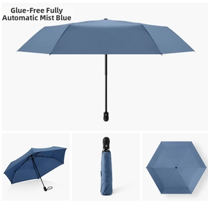 Haze blue automatic umbrella featuring glueless canopy in folded and open views