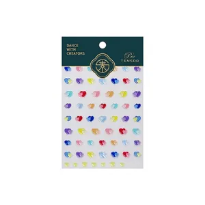 3D heart nail art stickers in various candy colors on white packaging card