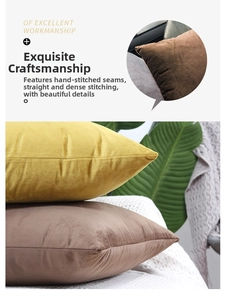 Close-up of velvet pillow covers with fine stitching details and mustard yellow fabric texture