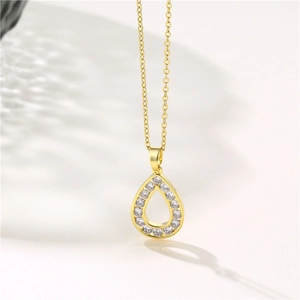 Elegant gold teardrop necklace with sparkling zircon halo pendant on fine chain link