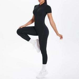 Detail of black short sleeve jumpsuit with front zipper and high elasticity fabric