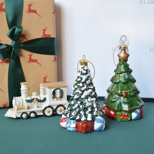 Christmas tree and steam train figurine set with festive gift box decorations