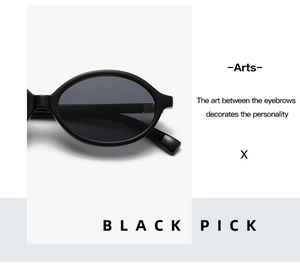 Close-up of black oval sunglasses frames with detailed size markings 47-25-145 on temple