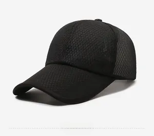 Close-up of black mesh baseball cap side with breathable fabric and metal logo detail