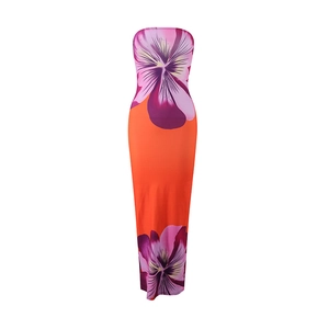 Detail view of the vibrant orange strapless maxi dress with purple floral patterns