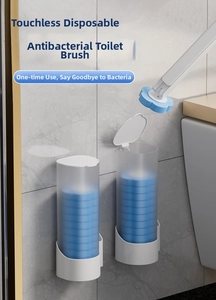 Wall-mounted disposable toilet brush set with blue sponge refill heads and storage base