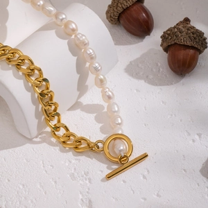 French vintage necklace with half natural pearls and half gold link chain with OT clasp