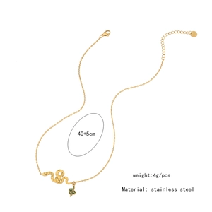 Detail of gold snake pendant necklace with green bead showing 40+5cm length measurements