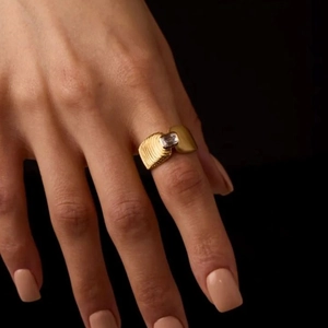 18K gold plated stainless steel ribbed ring with rectangle zircon on model hand