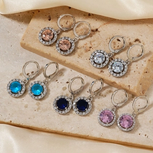 Elegant round micro-set earrings in champagne, blue, pink, and white on silk fabric