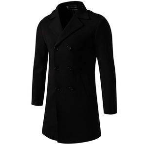 Detailed view of the double-breasted lapel and black wool texture of the men's overcoat