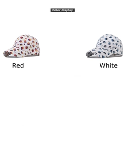 Detailed color display of cotton baseball caps with artistic ink splash patterns