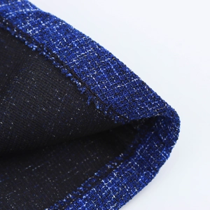 Women's sleeveless blue tweed business suit set featuring woven fabric texture details