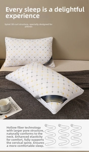 Close-up of white hotel pillow with diamond patterns and side breathable mesh details