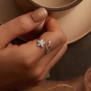 S925 sterling silver adjustable open ring featuring blue flower and leaf design