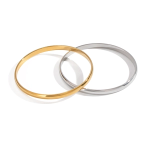 Minimalist stainless steel bangles in gold and silver finish with polished surface