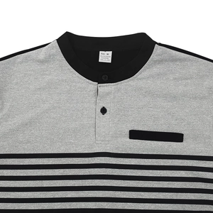 Detail of grey striped polo shirt collar showing fabric texture and size M label