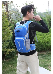 Outdoor cycling backpack in blue featuring multiple zipper layers and breathable mesh side pockets