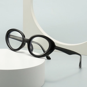 Retro cat-eye sunglasses with thick black frame shown from a stylish 45-degree angle