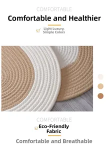 Detailed close-up of woven eco-friendly cotton mats on a rustic wood surface