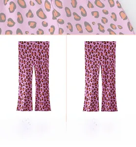 Detail of leopard print ribbed knit leggings for girls with flared leg design