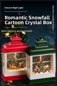 Detail of vintage Christmas lanterns with LED glowing snow scene and Santa figurines