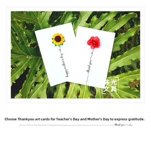 Detail of 3D fabric flower greeting cards with sunflower and rose on green leaves