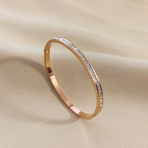 Elegant rose gold titanium steel bracelet with full pavé cubic zirconia inlay design