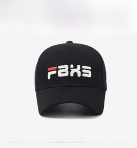 Detailed view of red and white FBXS letter embroidery on a black cotton baseball cap