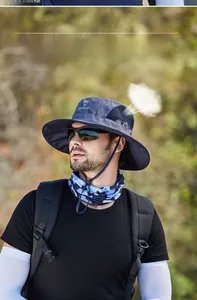 Detail of dark blue sun hat featuring a breathable mesh panel and adjustable chin strap