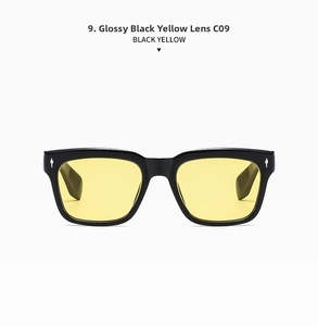 Close-up of retro square sunglasses in shiny black frame with translucent yellow lenses
